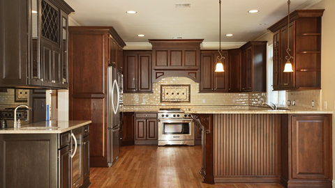 Custom Kitchen with Granite Countertops and Stainless Steel Appliances in Clark, New Jersey by Daunno Development.